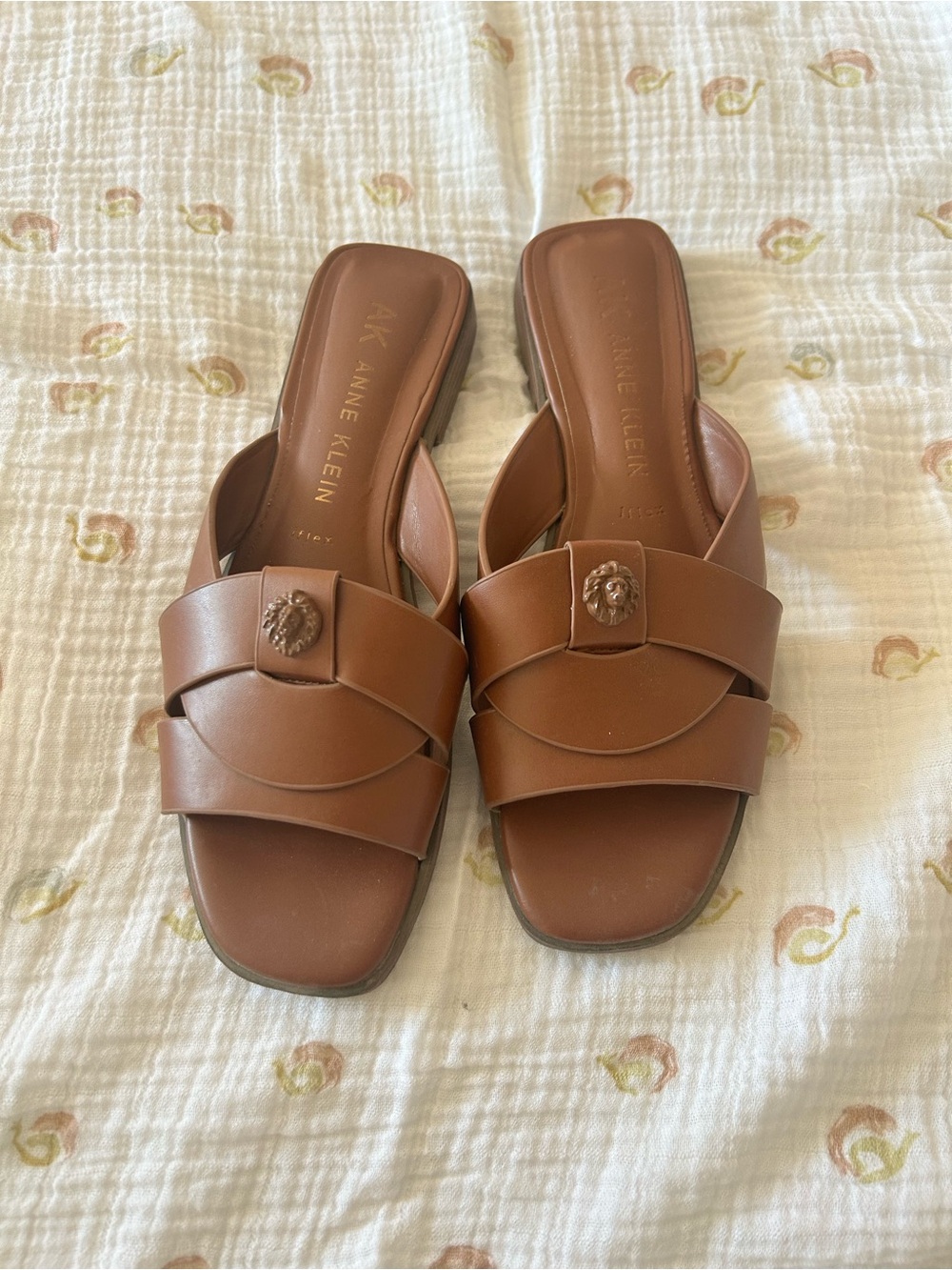 Anne Klein Tan Leather Double-Band Slide Mules with Lion Accent